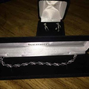 Set of diamond earrings and matching bracelet